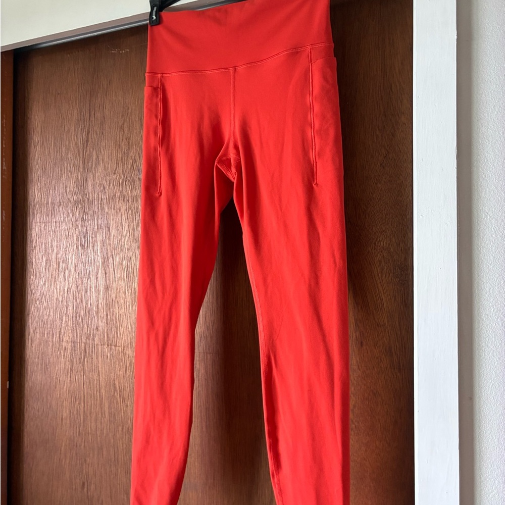 Athleta Transcend Stash Tight - Size Medium